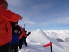 deb-waving-in-our-group-at-landing-on-top-of-the-world-day-4