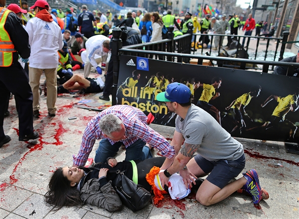Victim of Boston Explosion getting help