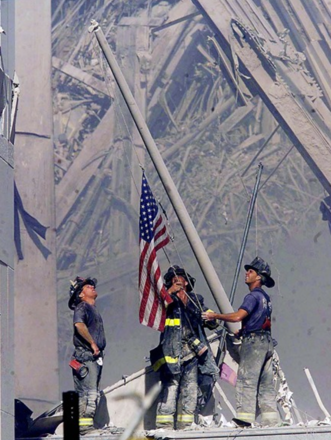 Iconic firemen photo of raising flag on 9:11 site