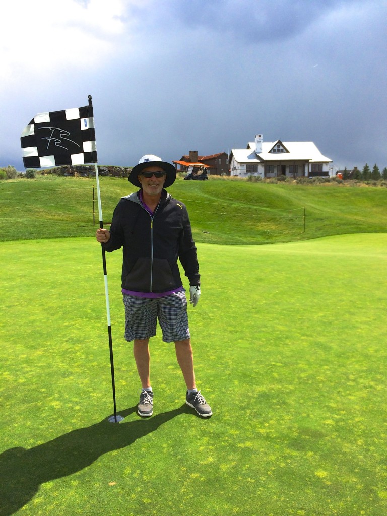 On the 8th green, with our house in the background